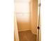 A carpeted closet includes a shelf for ample storage at 7940 White Oak Loop, Lithonia, GA 30038