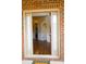 Elegant entryway with hardwood floors and arched doorways leading to the living spaces at 7940 White Oak Loop, Lithonia, GA 30038