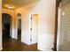 Beautiful entryway with hardwood floors, arched doorways, and decorative trim, welcoming you home at 7940 White Oak Loop, Lithonia, GA 30038