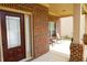 Cozy front porch featuring classic brickwork and room for seating, perfect for relaxation at 7940 White Oak Loop, Lithonia, GA 30038