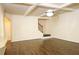 Open living room with hardwood floors, recessed lighting, trey ceiling, and chandelier at 7940 White Oak Loop, Lithonia, GA 30038