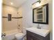 Clean bathroom with subway tile shower, tub, and updated vanity at 2076 W Flat Shoals Ter, Decatur, GA 30034