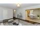 Open concept living and dining area with hardwood floors at 2076 W Flat Shoals Ter, Decatur, GA 30034