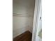 Empty closet has hardwood floors and is ready for storage at 4345 Wellington Pl, Cumming, GA 30040