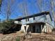 This home has a covered porch, chimney, and lots of curb appeal at 4345 Wellington Pl, Cumming, GA 30040