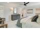 Main bedroom features neutral walls, ceiling fan, and a large window at 112 Winsome Way, Woodstock, GA 30188