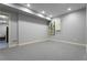 Unfinished basement area with neutral walls, carpeted floors and potential for customization at 192 Chicopee Ne Dr, Marietta, GA 30060