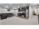 Finished basement has a kitchenette with stainless steel appliances and a comfortable seating area at 192 Chicopee Ne Dr, Marietta, GA 30060
