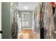 This walk in closet has a window, and hanging racks for the organization of clothing at 192 Chicopee Ne Dr, Marietta, GA 30060
