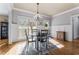 Bright dining room with hardwood floors and a chandelier at 192 Chicopee Ne Dr, Marietta, GA 30060