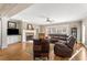 This living room features a fireplace, sofa, hardwood flooring and neutral paint at 192 Chicopee Ne Dr, Marietta, GA 30060