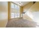 Large living room with high ceilings and many windows at 6005 Pattingham Dr, Roswell, GA 30075