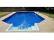 Sparkling blue pool with a spacious deck area at 6005 Pattingham Dr, Roswell, GA 30075