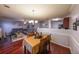 Formal dining room adjacent to living room with hardwood floors at 655 Barshay Dr, Covington, GA 30016