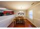 Dining area with hardwood floors and a table set for six at 655 Barshay Dr, Covington, GA 30016