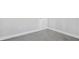 Spacious bedroom with grey carpet and an interior door at 3404 Mount Olive Rd, Atlanta, GA 30344