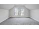 Spacious bedroom with grey carpet and large windows at 3404 Mount Olive Rd, Atlanta, GA 30344