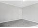 Spacious bedroom with grey carpet and an interior door at 3404 Mount Olive Rd, Atlanta, GA 30344