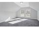 Bright bedroom featuring grey carpet and dual windows at 3404 Mount Olive Rd, Atlanta, GA 30344