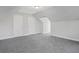 Large bonus room with grey carpet and sloped ceilings at 3404 Mount Olive Rd, Atlanta, GA 30344