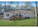 Back of house with deck and spacious yard at 3404 Mount Olive Rd, Atlanta, GA 30344
