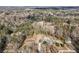 Overhead view of a home surrounded by trees with a long driveway at 860 Gardner Sw St, Austell, GA 30168