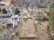 Birds eye view of the home with a fenced yard and a driveway at 860 Gardner Sw St, Austell, GA 30168