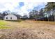The home's expansive backyard features level ground, grass, and a privacy fence at 860 Gardner Sw St, Austell, GA 30168