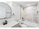 Stylish bathroom features a marble-tiled shower and modern vanity with matte black hardware at 860 Gardner Sw St, Austell, GA 30168