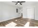 Large bedroom with hardwood floors, closet and a neutral palette offers an inviting space at 860 Gardner Sw St, Austell, GA 30168