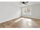Bright, airy bedroom with hardwood floors and large windows offers lots of natural light at 860 Gardner Sw St, Austell, GA 30168