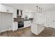 Well-designed kitchen with sleek cabinets, modern appliances, and a center island at 860 Gardner Sw St, Austell, GA 30168