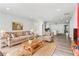 Cozy living room with a neutral color scheme, wood-look floors, and an open floor plan at 860 Gardner Sw St, Austell, GA 30168