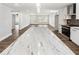 Spacious open-concept living area featuring a massive kitchen island with seating at 860 Gardner Sw St, Austell, GA 30168