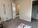 Neutral bedroom featuring wall decor and an open closet at 3885 Nixon Grove Dr, Douglasville, GA 30135