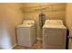 Bright laundry room with front-load washer and dryer at 3885 Nixon Grove Dr, Douglasville, GA 30135