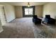 Generously sized main bedroom featuring plush carpeting, a ceiling fan, and neutral wall color at 3885 Nixon Grove Dr, Douglasville, GA 30135