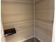Well-organized pantry with ample shelving provides plenty of storage space at 3885 Nixon Grove Dr, Douglasville, GA 30135