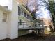 Wooden deck attached to the back of a white brick house at 4052 Pocono Ct, Stone Mountain, GA 30083