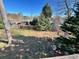 View of the backyard with a wooden fence and mature trees at 3928 Potomac Nw Dr, Kennesaw, GA 30144