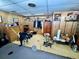 Room featuring wood paneling with assorted storage furniture and visible lighting at 3928 Potomac Nw Dr, Kennesaw, GA 30144