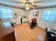Bedroom featuring a ceiling fan, two windows, and a wooden dresser at 3928 Potomac Nw Dr, Kennesaw, GA 30144