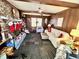 Comfortable living room with a patterned rug, fireplace, and ample seating with overhead lighting at 3928 Potomac Nw Dr, Kennesaw, GA 30144