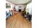 Bright living room with hardwood floors, a large window, and a Christmas tree at 3928 Potomac Nw Dr, Kennesaw, GA 30144