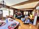 Inviting living and dining areas featuring wood beams and natural light, with a view into the living room at 3928 Potomac Nw Dr, Kennesaw, GA 30144