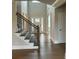 Elegant entryway with hardwood floors and a staircase at 4010 Sierra Vista Cir, Cumming, GA 30040