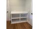 Built-in shelving unit with white finish and a quartz countertop at 4010 Sierra Vista Cir, Cumming, GA 30040