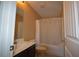 Bathroom with tub/shower combo and a vanity at 7765 Haynes Park Cir, Lithonia, GA 30038
