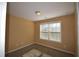 Small bedroom with neutral walls and carpeting at 7765 Haynes Park Cir, Lithonia, GA 30038