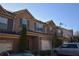 Brick townhouse exterior with two-car garage at 7765 Haynes Park Cir, Lithonia, GA 30038